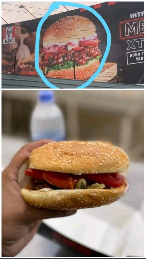 Comparing KFC burger in hand with one on the billboard